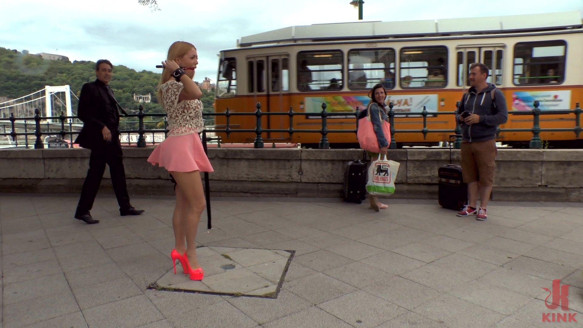 Busty blonde isabella clark public double penetration part 1. Large Tit Blonde Isabella Clark is here to show off her amazing bottom to the public of Budapest! But first Steve Holmes takes this bitch out in public for a deep throat blowjob. People are just amazed and shocked to see this prostitute blow down Steve's giant cock in public! Isabella is then strapped down in leather bondage and a ball gag and taken to an open restaurant where the rowdy crowd gets to watch this bitch perform! Caning, Flogging, Corporal Punishment, Tit Slapping, ass, Double ass, Double Penetration, ass Fisting!!! This true prostitute takes it all and then licks it all up afterwards!