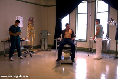Photo number 1 from The Spanish Patient shot for Bound Gods on Kink.com. Featuring Romario Faria, TJ Young and Van Darkholme in hardcore BDSM & Fetish porn.